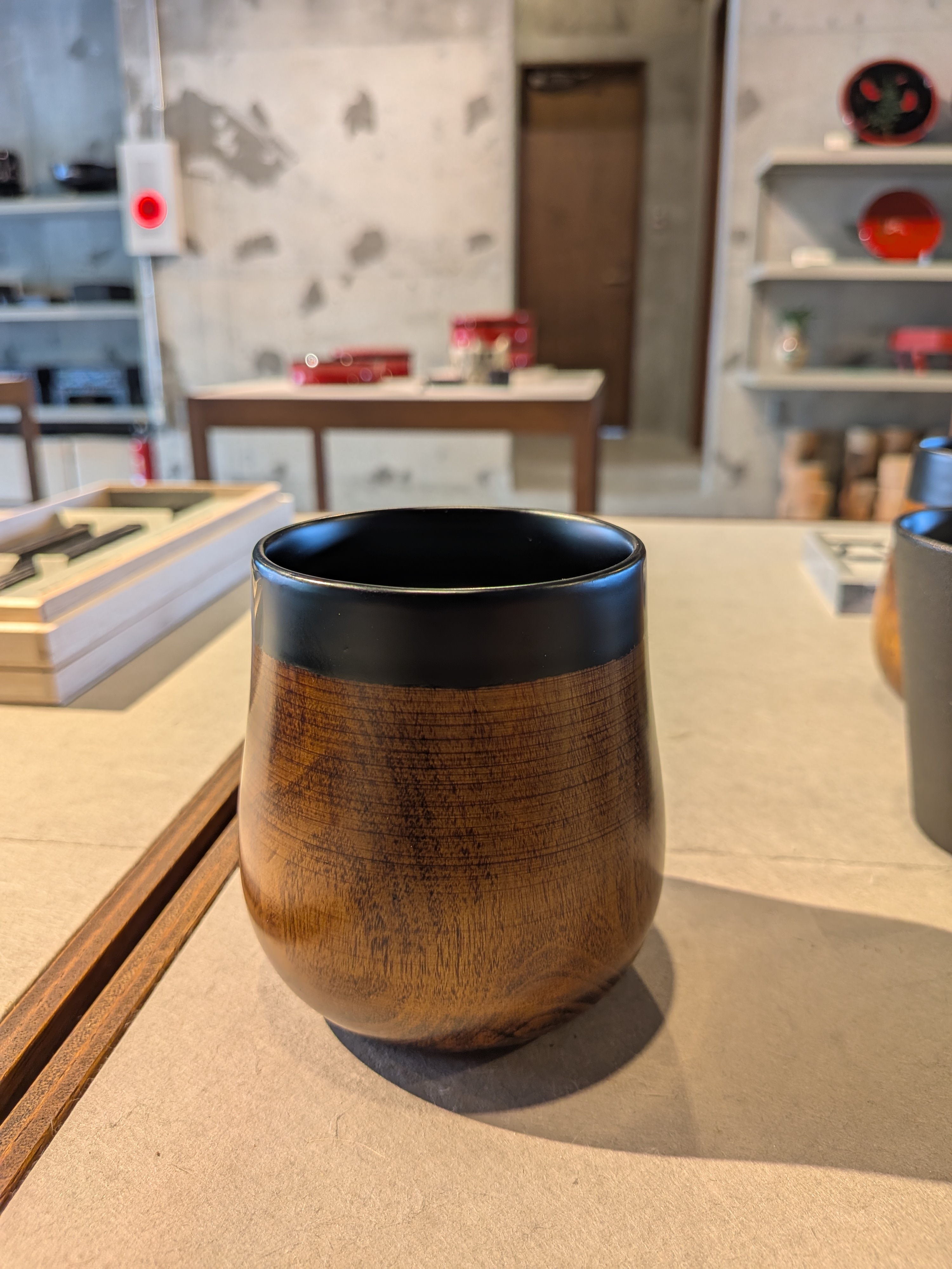 Okinawan Ryukyu Naha Lacquerware Collection: Kakuman Fine Lacquerware, Handcrafted “Nekoashi” (Cat-Foot) Inspired Wood & Matte Black Urushi Cup - thumbnail 1
